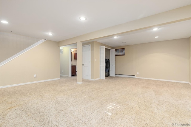 1246 S Telluride St, Aurora, CO 80017 - finished below grade area featuring carpet flooring, a baseboard heating unit, and recessed lighting