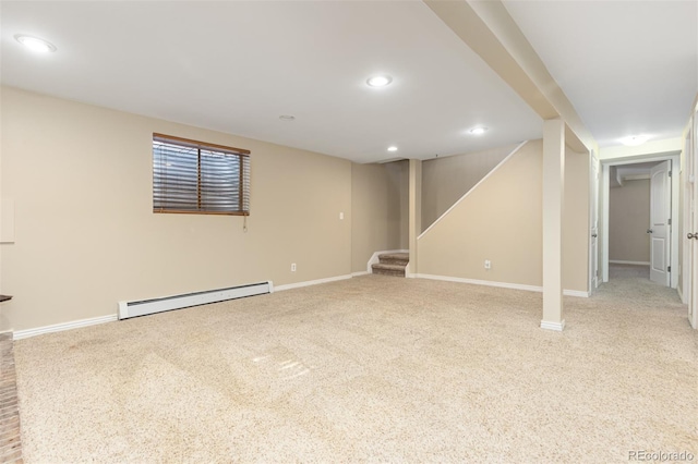 1246 S Telluride St, Aurora, CO 80017 - finished below grade area with a baseboard radiator, carpet, stairs, and recessed lighting