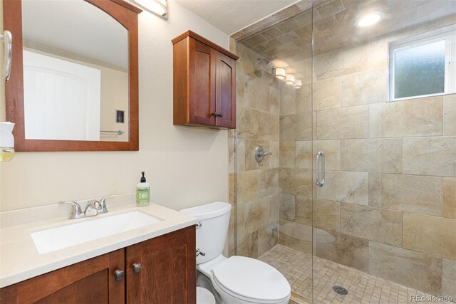 1246 S Telluride St, Aurora, CO 80017 - bathroom featuring vanity and a shower stall