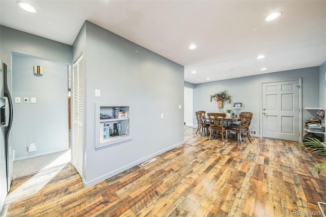 dining room with light wood-type flooring