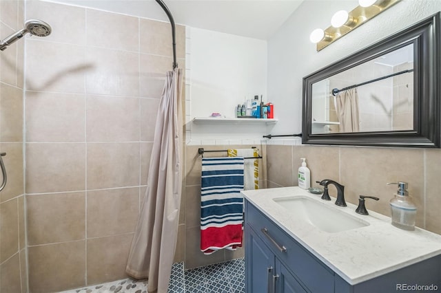 bathroom with walk in shower, tile patterned flooring, decorative backsplash, vanity, and tile walls