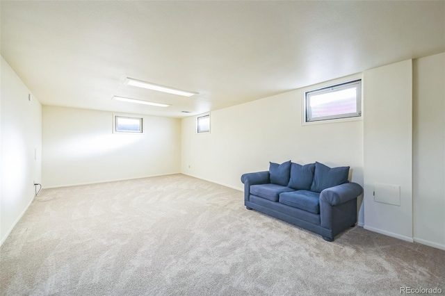 living area with light carpet