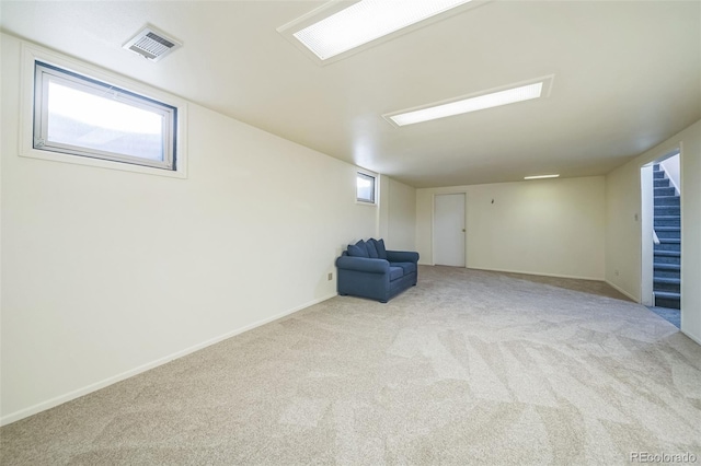 basement with light colored carpet