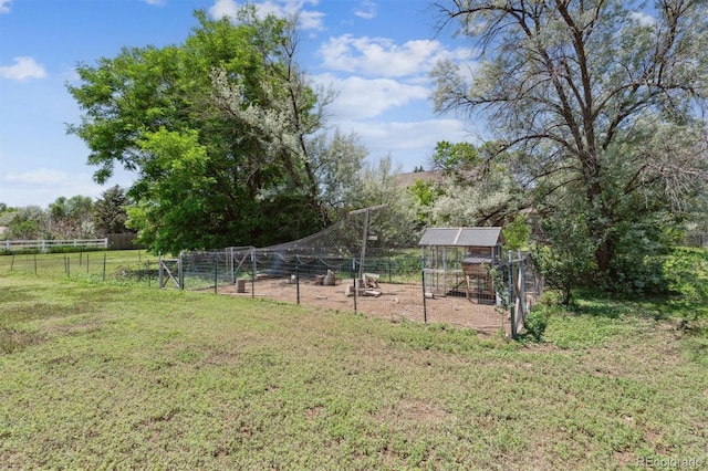 1808 Riverview Dr, Berthoud, CO 80513 - view of yard featuring exterior structure and an outdoor structure