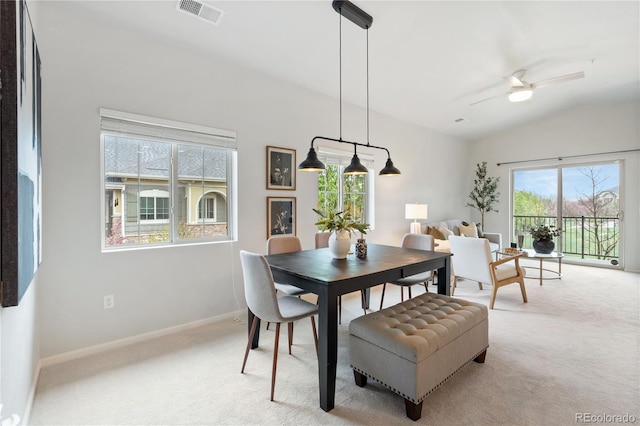 11364 Xavier Dr Unit 205, Westminster, CO 80031 - dining space with visible vents, a ceiling fan, lofted ceiling, and light carpet