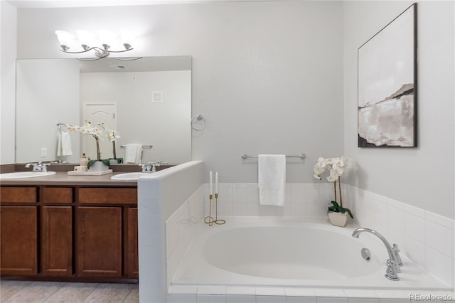 11364 Xavier Dr Unit 205, Westminster, CO 80031 - full bath with double vanity, a sink, and a bath