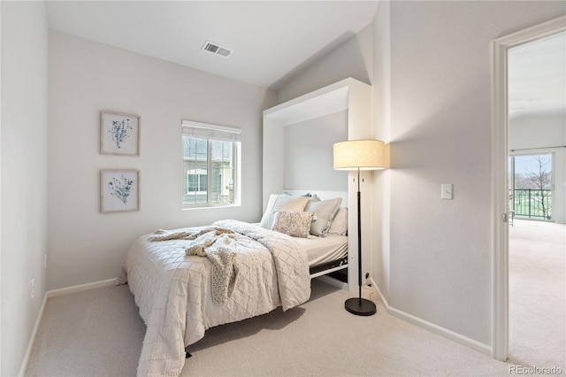 11364 Xavier Dr Unit 205, Westminster, CO 80031 - carpeted bedroom featuring baseboards, multiple windows, lofted ceiling, and visible vents
