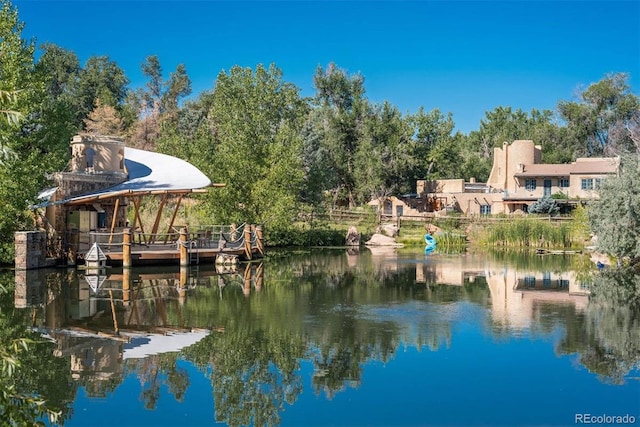 dock area featuring a water view