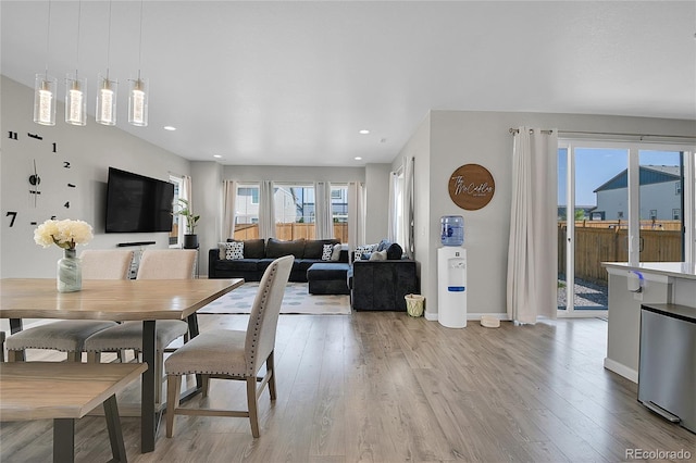 dining space featuring light wood-type flooring