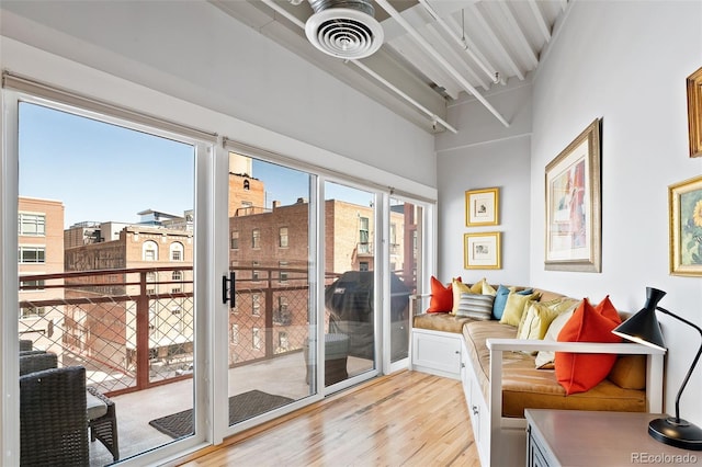 sunroom with beam ceiling