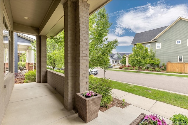 8768 E 54th Pl, Denver, CO 80238 - porch featuring a residential view
