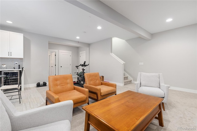 8768 E 54th Pl, Denver, CO 80238 - living area featuring stairs, light carpet, recessed lighting, bar area, and baseboards