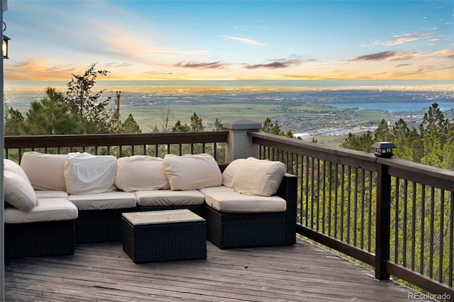 9001 Eastridge Rd, Golden, CO 80403 - deck at dusk with an outdoor hangout area and a water view