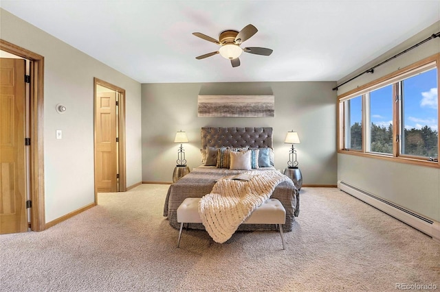 9001 Eastridge Rd, Golden, CO 80403 - bedroom featuring carpet floors, a baseboard heating unit, baseboards, and a ceiling fan