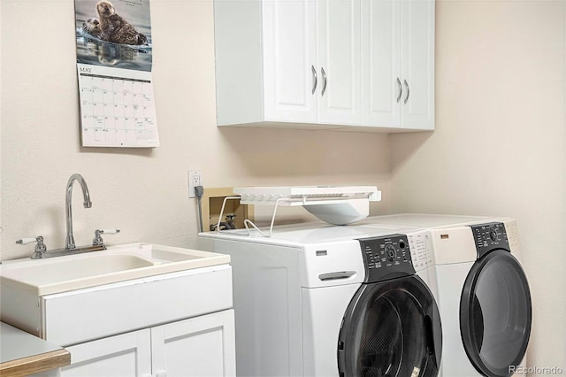 9001 Eastridge Rd, Golden, CO 80403 - washroom with cabinet space and independent washer and dryer