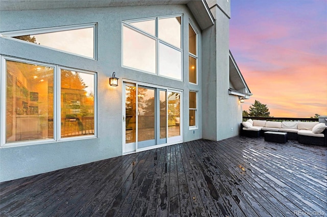 9001 Eastridge Rd, Golden, CO 80403 - deck at dusk featuring an outdoor hangout area