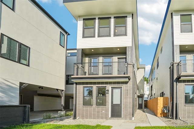 1559 N Hooker St, Denver, CO 80204 - back of house featuring a balcony