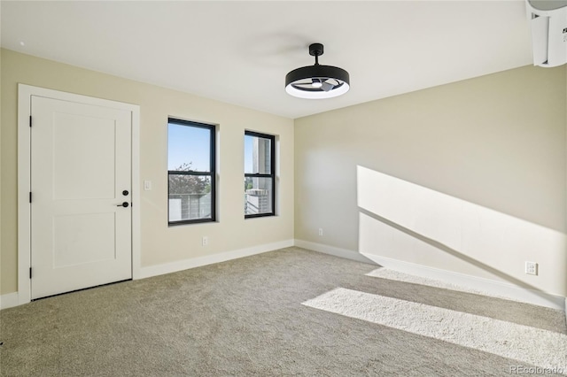 1559 N Hooker St, Denver, CO 80204 - carpeted empty room with baseboards