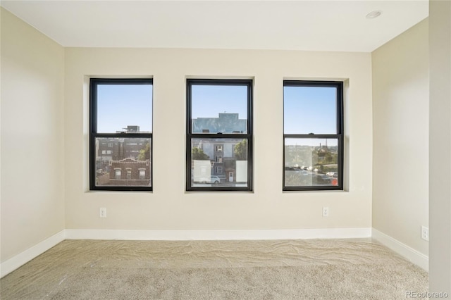 1559 N Hooker St, Denver, CO 80204 - unfurnished room with carpet floors and baseboards