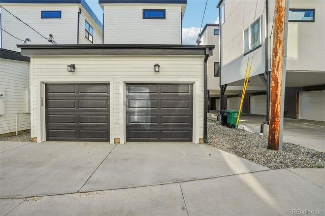 1559 N Hooker St, Denver, CO 80204 - garage featuring concrete driveway