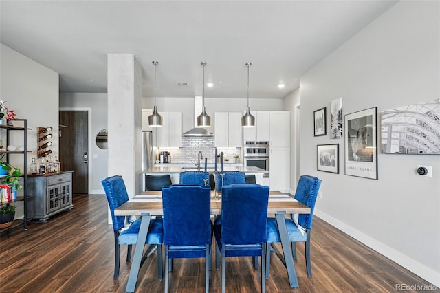 20 Wilcox St Unit 208, Castle Rock, CO 80104 - dining area with dark wood-style floors and recessed lighting