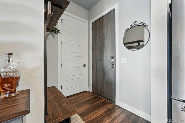 20 Wilcox St Unit 208, Castle Rock, CO 80104 - foyer entrance with dark wood-style flooring