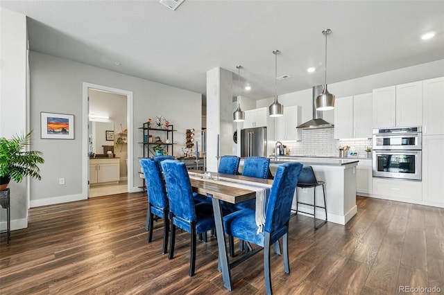 20 Wilcox St Unit 208, Castle Rock, CO 80104 - dining room with dark wood-type flooring and recessed lighting