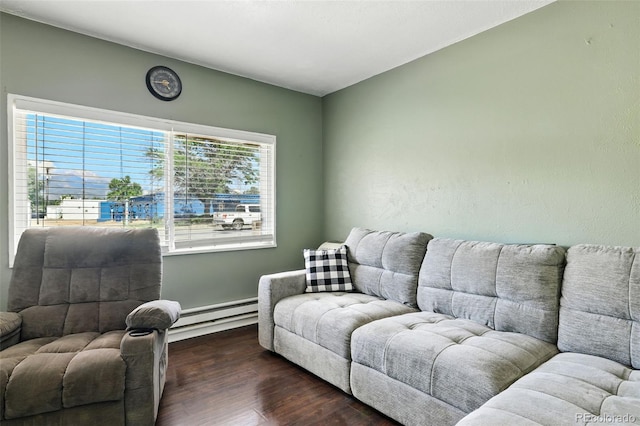 613 S Union Blvd, Colorado Springs, CO 80910 - living room with wood finished floors and a baseboard radiator