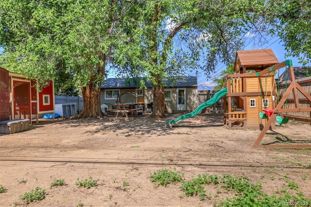613 S Union Blvd, Colorado Springs, CO 80910 - view of play area featuring an outbuilding