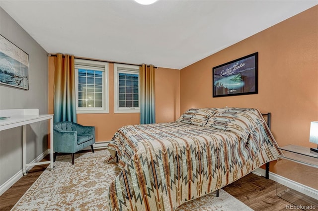 bedroom featuring hardwood / wood-style flooring