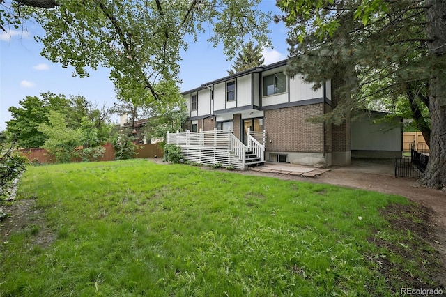 3070 W Enchanted Cir, Colorado Springs, CO 80917 - rear view of property featuring brick siding