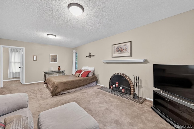 3070 W Enchanted Cir, Colorado Springs, CO 80917 - bedroom with carpet flooring, baseboards, a textured ceiling, and a brick fireplace
