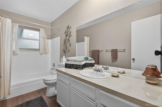 3070 W Enchanted Cir, Colorado Springs, CO 80917 - full bathroom featuring vanity, shower / bath combo, wood finished floors, and toilet
