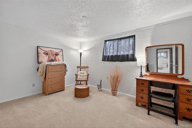 3070 W Enchanted Cir, Colorado Springs, CO 80917 - sitting room featuring a textured ceiling, a textured wall, light colored carpet, and baseboards