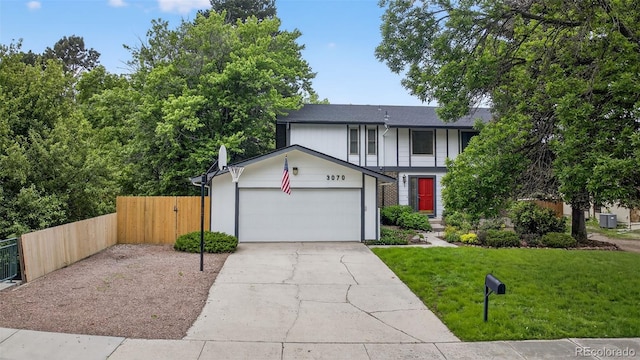 3070 W Enchanted Cir, Colorado Springs, CO 80917 - view of front facade featuring an attached garage, concrete driveway, and central AC