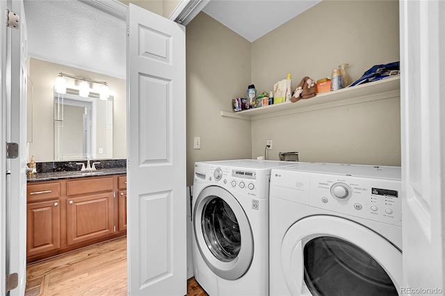 9008 W 101st Ave, Broomfield, CO 80021 - laundry area featuring independent washer and dryer and light wood finished floors