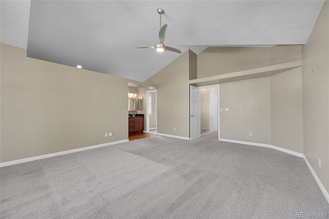 9008 W 101st Ave, Broomfield, CO 80021 - unfurnished living room with a ceiling fan, carpet, a textured ceiling, and high vaulted ceiling