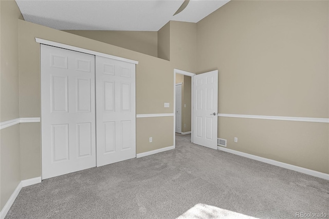 9008 W 101st Ave, Broomfield, CO 80021 - unfurnished bedroom featuring lofted ceiling, carpet floors, and a closet