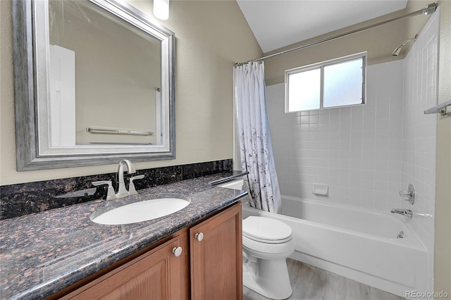 9008 W 101st Ave, Broomfield, CO 80021 - full bath featuring vanity, shower / tub combo, and wood finished floors