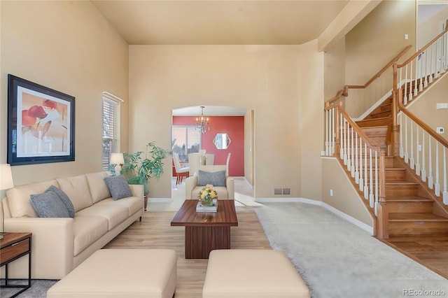 living room featuring an inviting chandelier