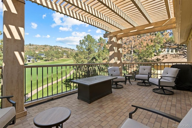 view of patio featuring a pergola