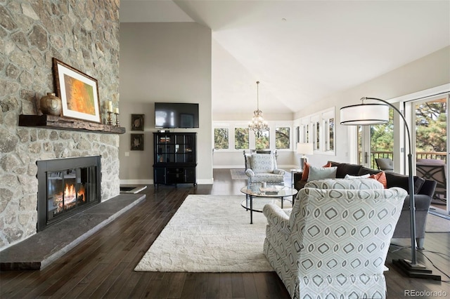 living room with high vaulted ceiling, a wealth of natural light, and dark hardwood / wood-style flooring