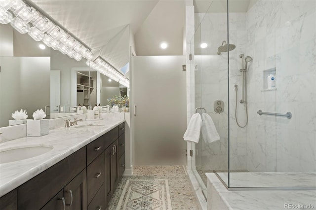 bathroom with vanity and walk in shower