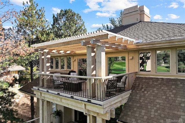 wooden terrace with a pergola