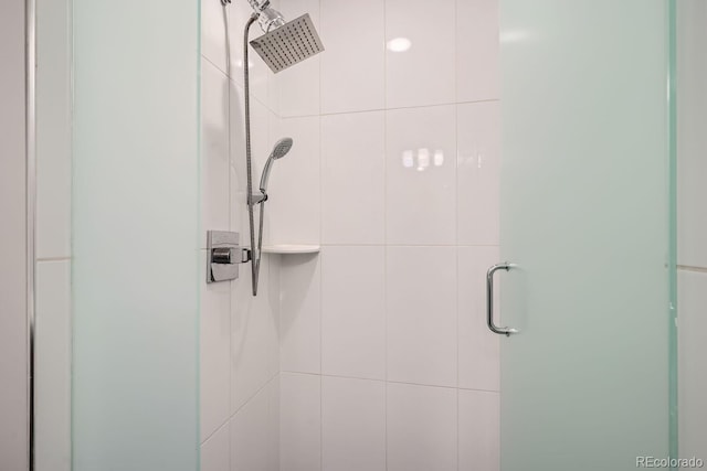 bathroom featuring a shower stall