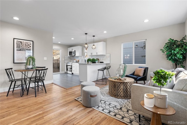 living room featuring light wood-type flooring