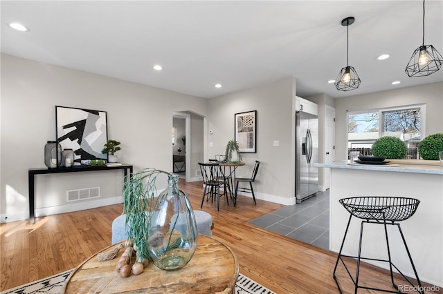 dining area featuring hardwood / wood-style flooring