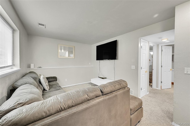 4259 S Richfield St, Aurora, CO 80013 - living room featuring light carpet and baseboards