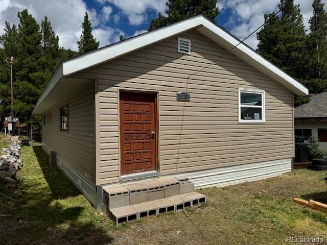 325 Aspen Rd, Idaho Springs, CO 80452 - view of side of property featuring a lawn