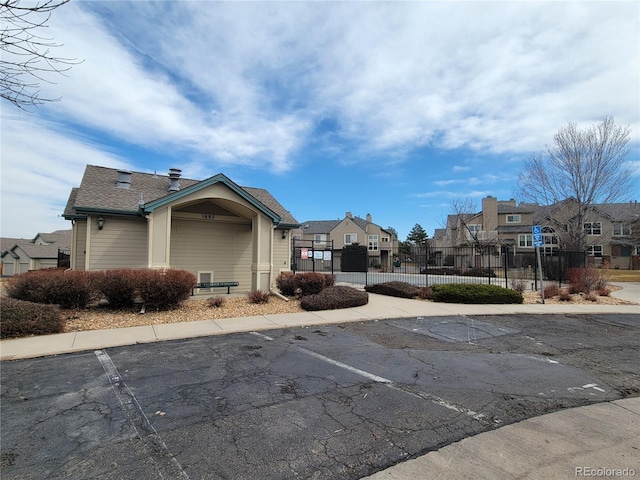 view of road featuring sidewalks and a residential view